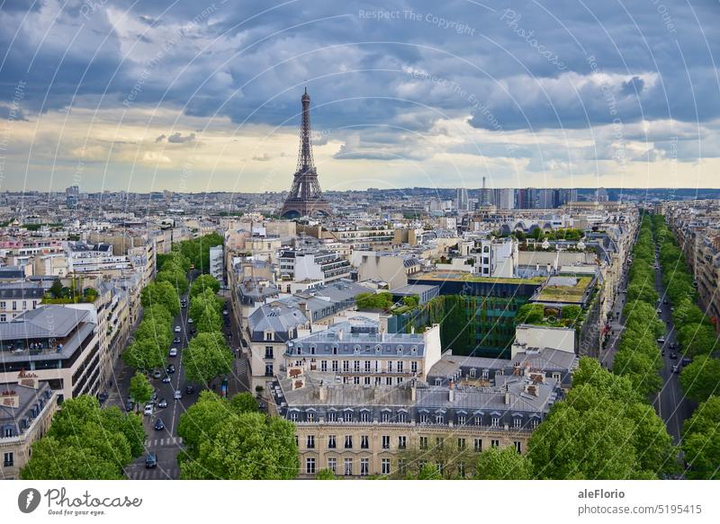 Paris seen from Triumphal Arch tour eiffel Eiffel Tower Arc de Triomphe cloudy Trees monument building travel landmark city capital eiffel tower europe france