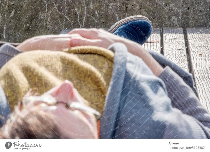 hibernation Lie Rest Woman Calm Relaxation rest Peaceful Footbridge sunbathe Sunbathing warm relaxed Sleep Jacket Autumn Winter Warmth Dream Fatigue Serene