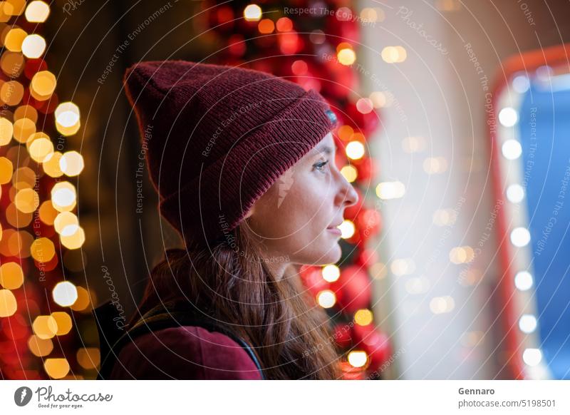 Girl in front of the Christmas shop windows. decoration caucasian female night lifestyle cute portrait winter beautiful people happy holiday christmas at night