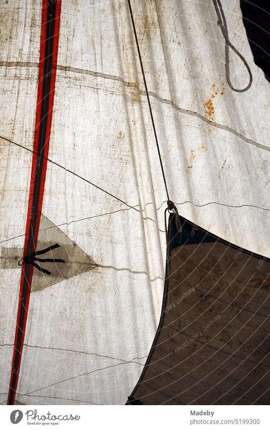 Dirty old tent roof in beige and natural colors in the sunshine at the weekly market and bazaar in the district of Erenköy in Sahrayicedit in Istanbul on the Bosphorus in Turkey