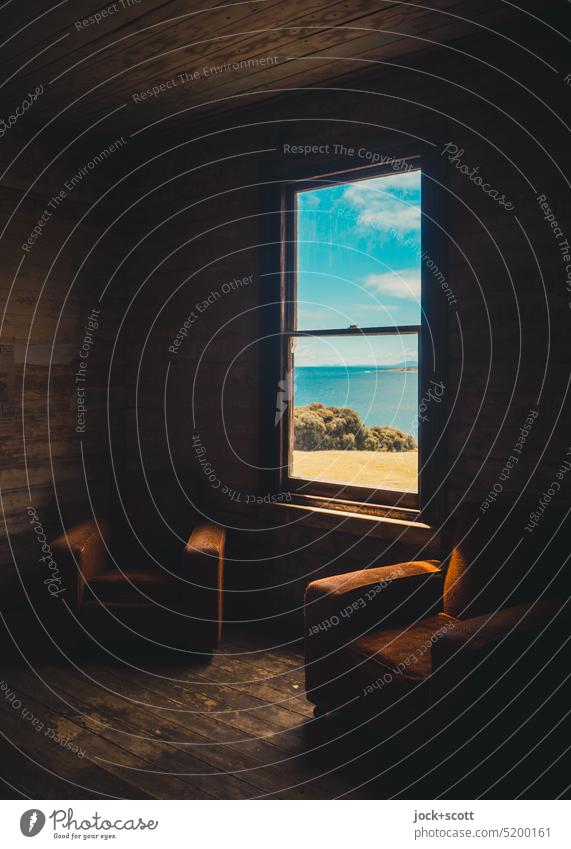 Living room with view of the end of the world Ruby Hunt's Cottage Window View from a window Room Lifestyle Shadow Shaft of light Tasmania Style Clouds Australia