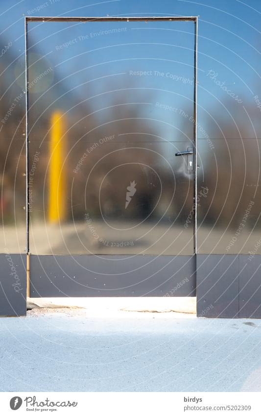 inconspicuous door in a mirroring surface Front door reflection Reflection mirror surface Mirror Entrance Dull