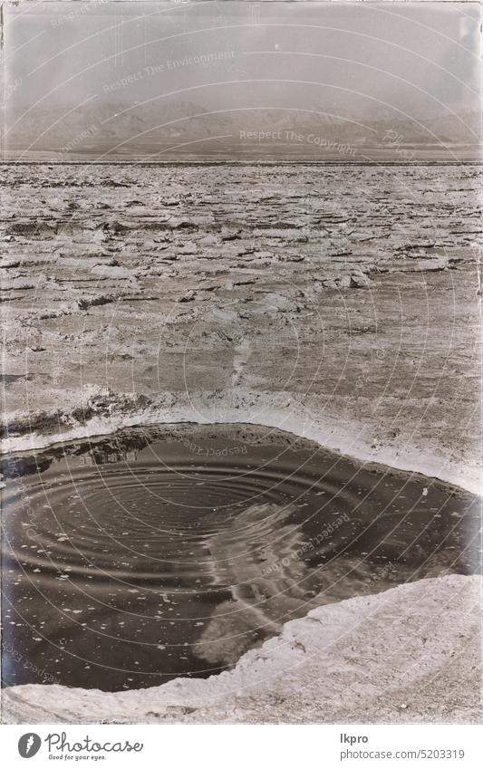 in   ethiopia africa    the black lake and sky petroleum volcano danakil dallol depression afar oil nature beauty water travel vibrant danger mineral toxic