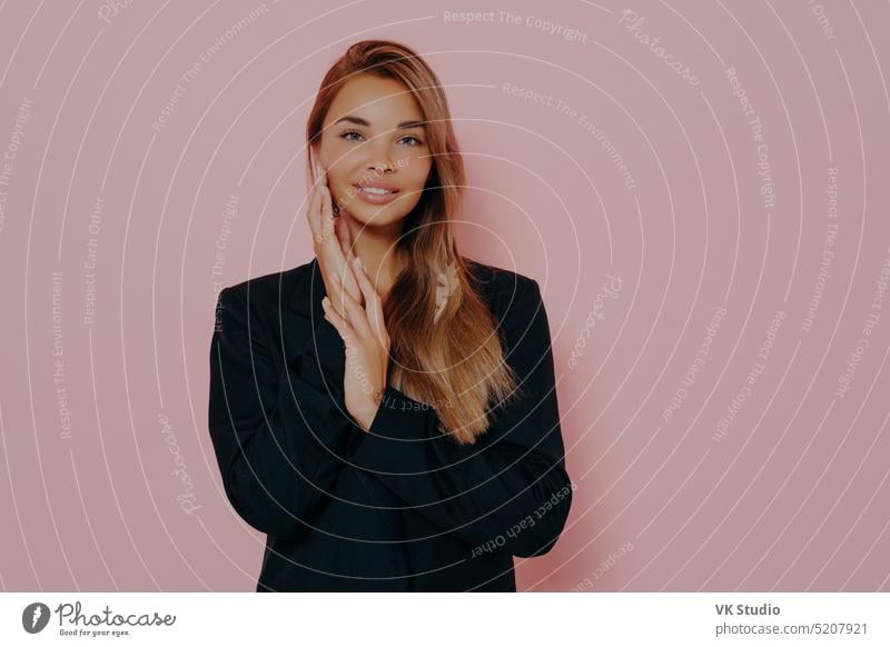 Portrait of cheerful long haired businesswoman in black formal jacket young office model looking leader happy friendly female executive entrepreneur caucasian