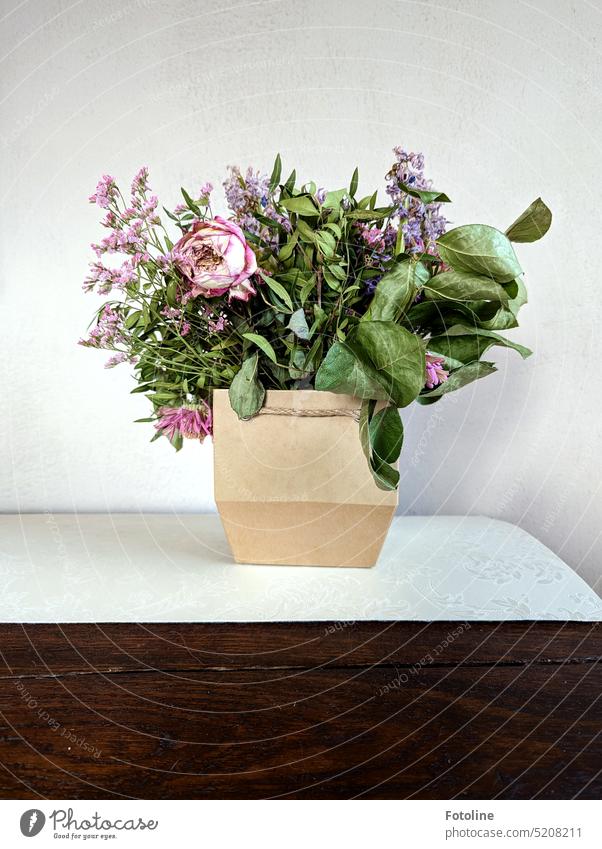 On my old chest is a slowly fading bouquet of flowers. They are still fragrant, but soon it's off to the compost heap with them. Bouquet Flower Blossom Plant