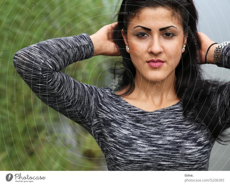 Woman, immediately tying a braid portrait Inspiration pretty Long-haired Jewellery Black-haired Looking into the camera Skeptical Curiosity Concentrate Earring