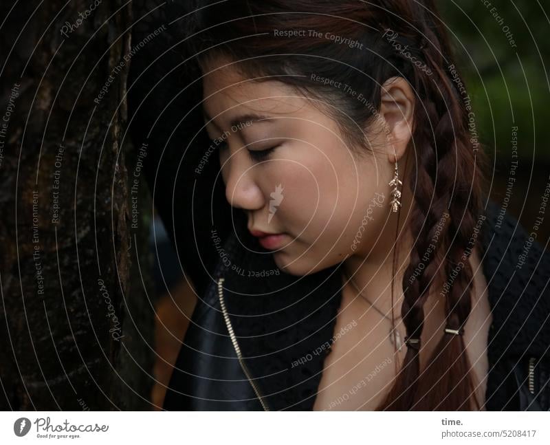 Woman with double braid portrait Feminine Emotions Modest Calm Patient Serene Attentive Watchfulness Trust Contentment Safety (feeling of) Warmth pretty Happy