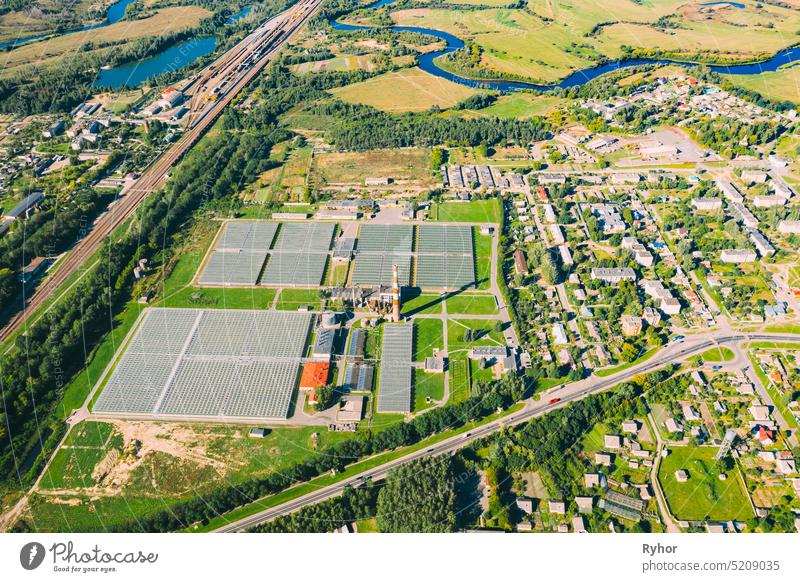 Aerial View Greenhouses For Growing Flowers, Vegetables And Fruits. Agricultural And Industrial Buildings fruit vegetable garden rural glass house