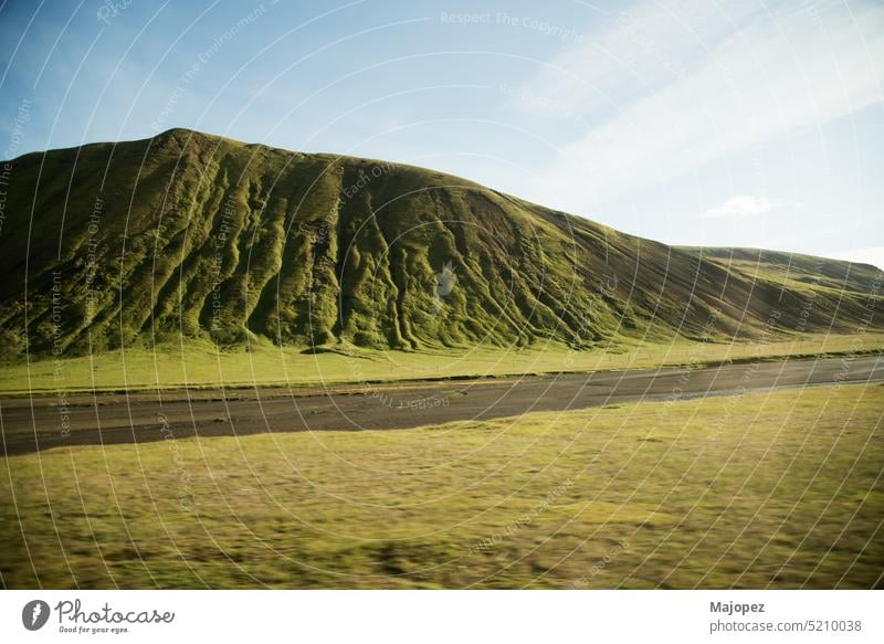 Volcanic landscape with green mountain. environment meadow background countryside field adventure beautiful blue cloud clouds europe forest high hiking hill