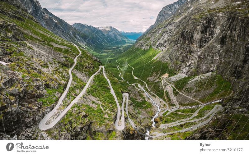 Trollstigen, Andalsnes, Norway. Serpentine Mountain Road Trollstigen. Famous Norwegian Landmark And Popular Destination. Norwegian County Road 63 In Summer Day