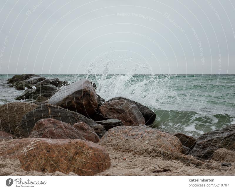 Breaking waves at the breakwater Adventure Blue Sky relaxation Relaxation rock Rock Photography pebble coast Coastal idyll coastal landscape Coastal love