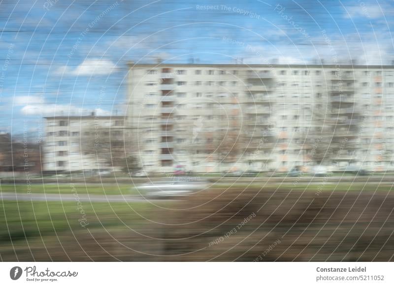 Facade with many balconies and windows - ICM Sunlight urban blurriness Abstract vibrating ICM technology hazy Unclear abstract photography blurred dwell City