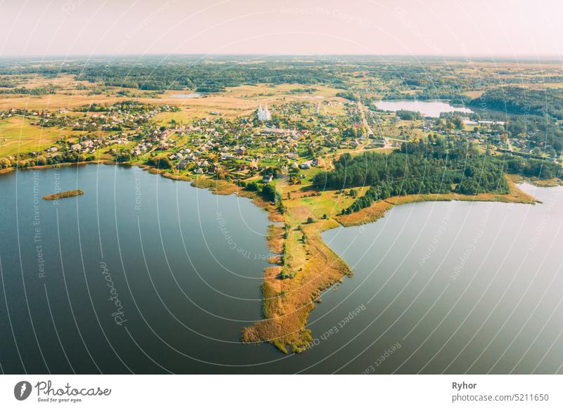 Slobodka, Braslaw District, Vitebsk Voblast, Belarus. Aerial View Of Potsekh Lake, Green Forest Landscape Near Slobodka Village. Top View Of Beautiful European Nature From High Attitude. Bird's Eye View. Famous Lakes