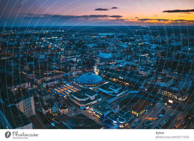 Brest, Belarus. Aerial Bird's-eye View Of Brest Cityscape Skyline. Bird's-eye View Of Brest Market In Evening Illuminations europe belarus brest tourism town