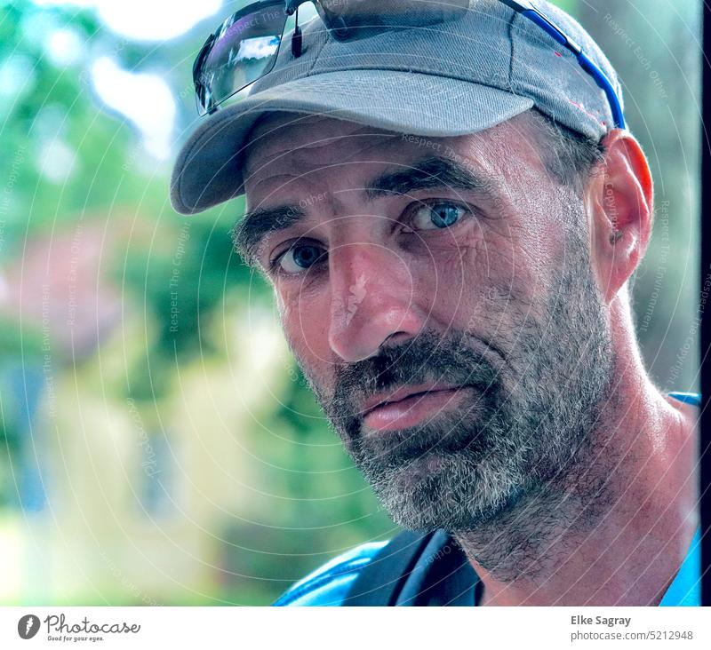 Portrait of a young man looking mysteriously into the camera portrait Human being Close-up Looking into the camera Man Masculine Facial hair Young man