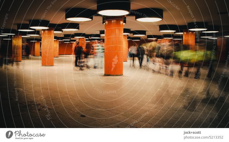 Hustle and bustle underground, a come or go Underpass Long exposure Lanes & trails Pedestrian Subsoil Architecture Retro Column Tile Orange Lighting motion blur