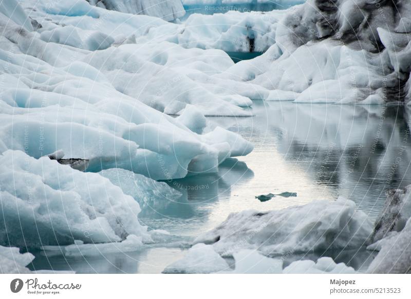 Close up of iceberg at Jokulsarlon glacier lagoon melting winter beauty climate glacial outdoor arctic beautiful snow travel blue climate change close up cloud