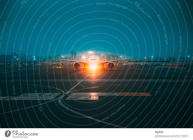 Aircraft Airplane Stand On Runway In Evening Night Time. travel tourism transport passenger aircraft runway aeroflot airline airlines airplane airport aviation