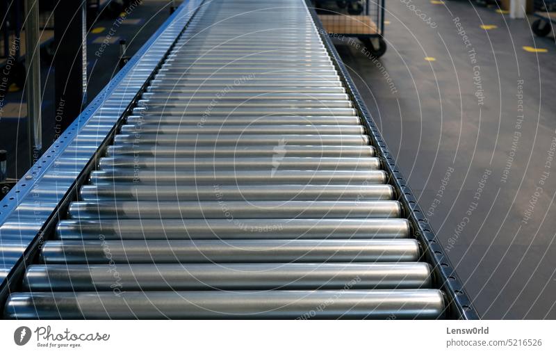 Conveyor belt inside a warehouse conveyor belt delivery distribution distribution center empty factory industry line logistics logistics center modern nobody