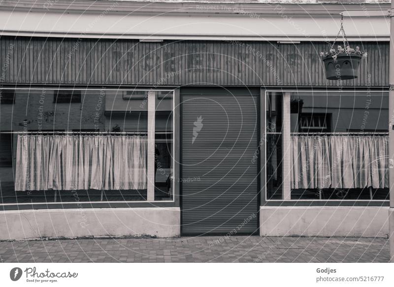 Facade of old furniture store House (Residential Structure) House front furniture shop Historic Past Transience Old Building Decline Wall (building)