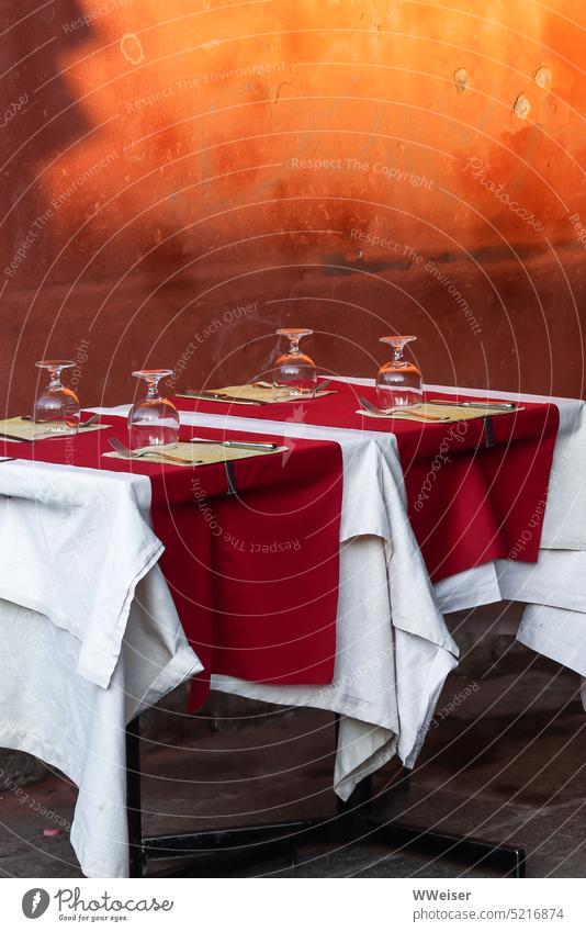 The tables are set and waiting for guests to have a romantic dinner Table Restaurant warm Light Sunlight Morning early Evening Dinner Customers Eating