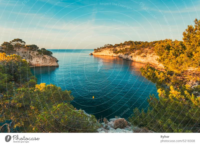 Calanques, Cote de Azur, France. Beautiful nature of Calanques on the azure coast of France. Calanques - a deep bay surrounded by high cliffs. Landscape in sunrise light during Sunny summer morning