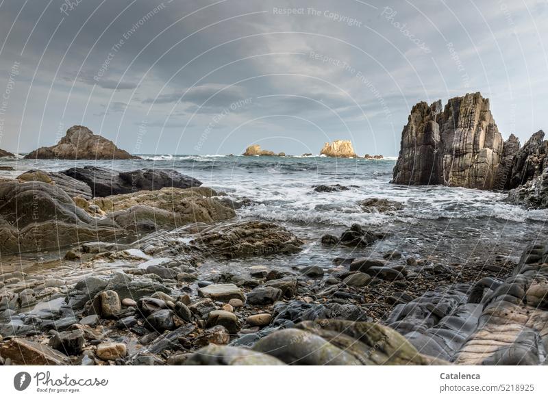 Rocky beach landscape, the tide is coming coast Beach Horizon Water Nature Sky Weather Day Climate daylight Environment Maritime Ocean Rock formation