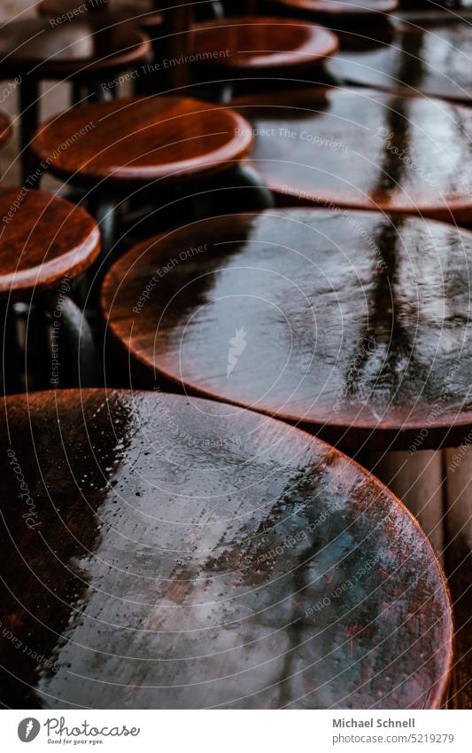 Rain: Nothing going on in the street cafe chairs Seating Furniture Gastronomy Closed Empty Wet raindrops nothing going on Beer garden Reflections Sidewalk café