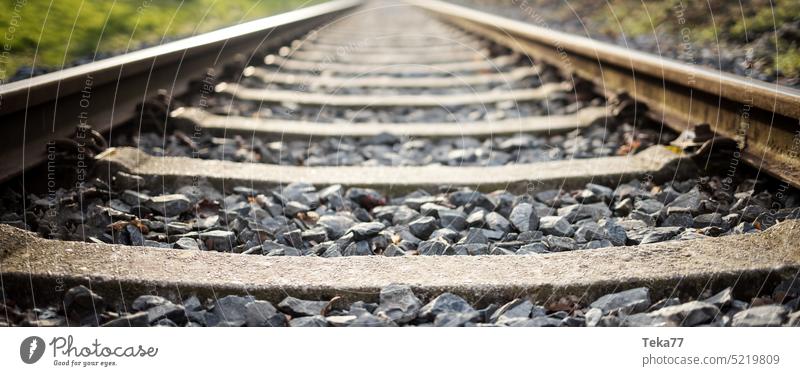 a railway track blur background panorama railway tracks rails railway blur sharp modern railway transportation rail transportation passenger railway