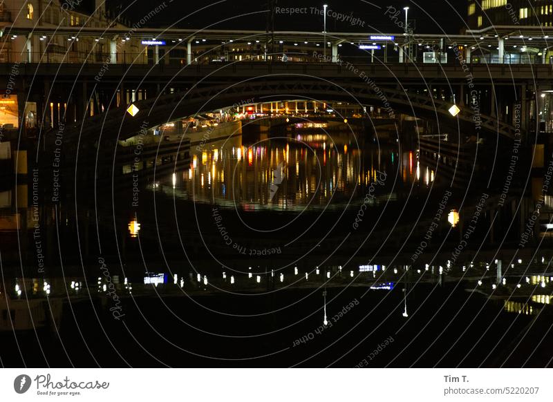 View through bridge with reflections Berlin Middle Spree Night Reflection Colour photo Bridge Capital city Town Architecture Downtown Berlin Exterior shot