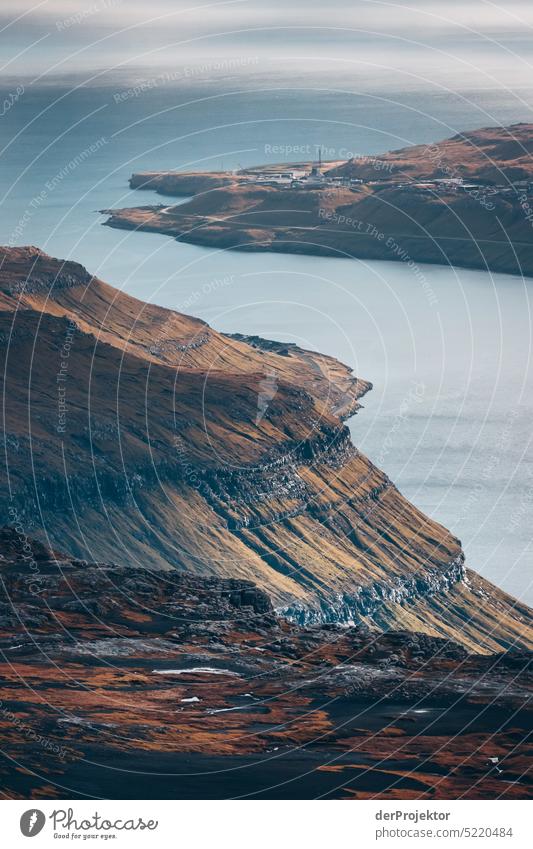 View over landscape and fjord Street rocky Bad weather Environment Hill Rock highlands Rural harmony Weather Picturesque Faroe Islands Sunlight idyllically