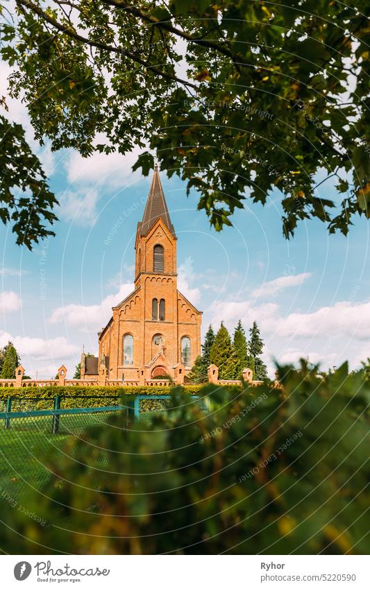 Opsa, Braslav District, Vitebsk Region, Belarus. Church Of St. John The Baptist In Sunny Day europe belarus Church Of St John The Baptist St John Baptist