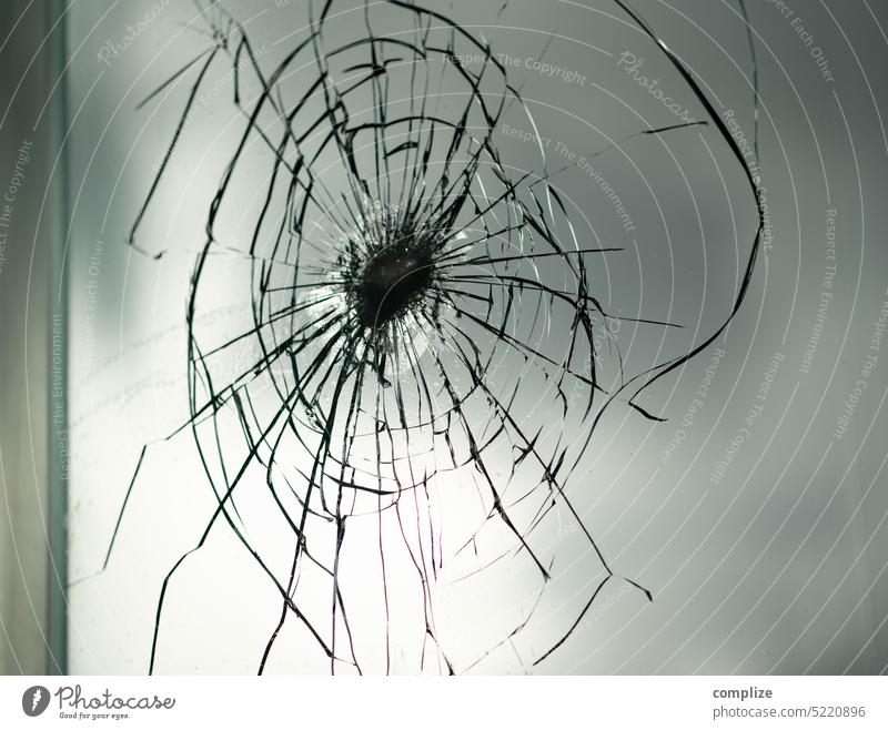 Thick glass with damage Glass Pane Glas facade Glass wall Transparent Slice corrupted Crack & Rip & Tear cracks Shot Assault Breakage glass break Circular