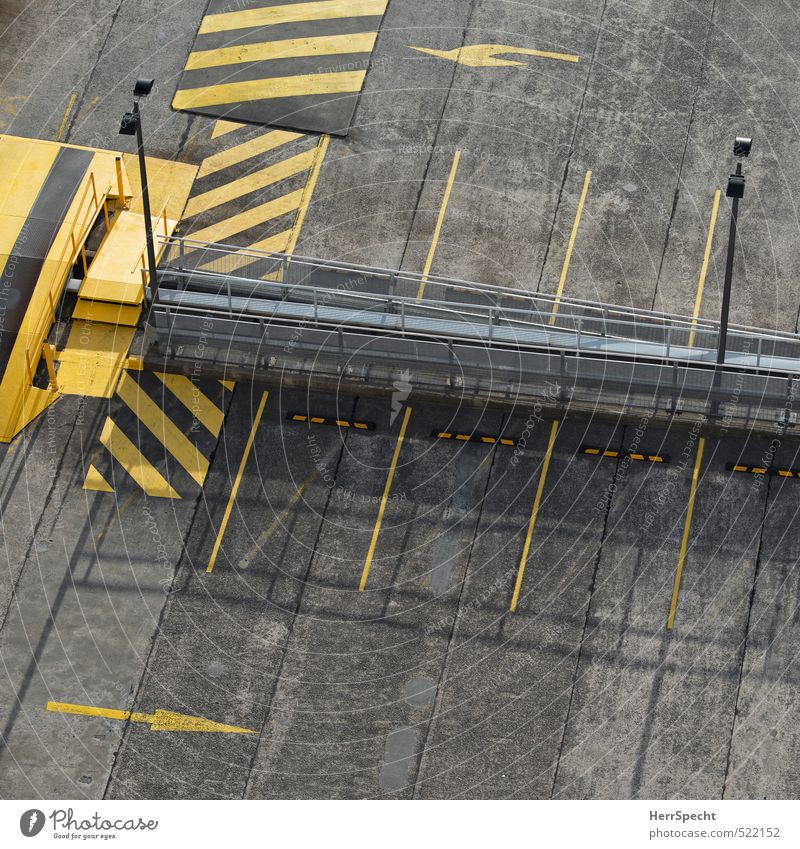 parking space Town Manmade structures Building Roof Transport Road traffic Motoring Signs and labeling Gloomy Yellow Gray Empty Free Free space Parking lot