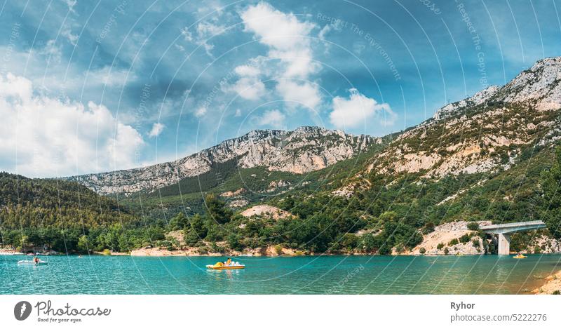 People Floating On Catamarans On The St Croix Lake In The Gorges Du Verdon In South-eastern France. Provence-Alpes-Cote DAzur attraction beautiful blue