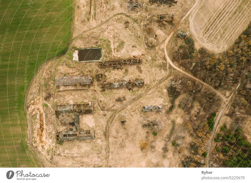 Belarus. Abandoned Barn, Shed, Cowsheds, Farm House In Chernobyl Resettlement Zone. Chornobyl Catastrophe Disasters. Dilapidated House In Belarusian Village. Whole Villages Must Be Disposed