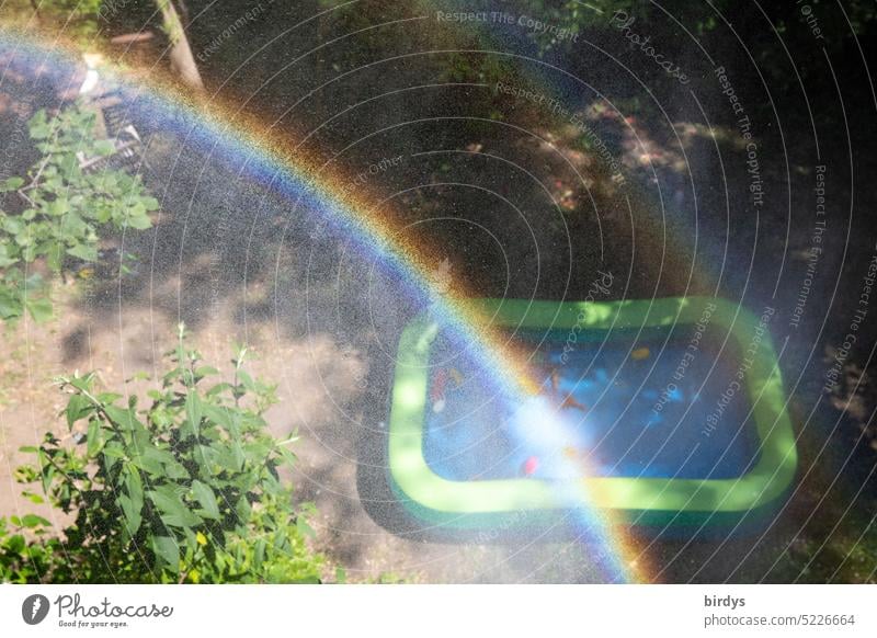 Rainbow over paddling pool in garden bathing fun Infancy Paddling pool Summer Water Refreshment Swimming & Bathing Garden Bird's-eye view Swimming pool