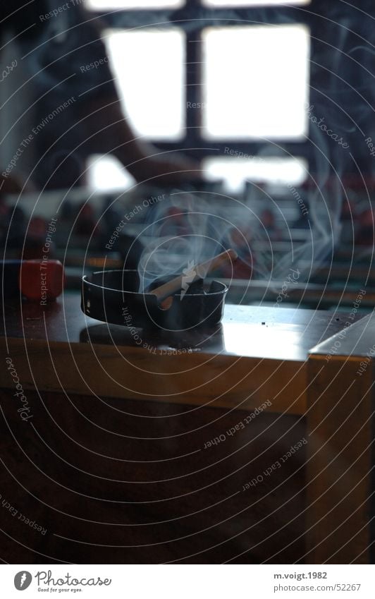 gambling den Colour photo Interior shot Copy Space bottom Contrast Back-light Deep depth of field Smoking Playing Table soccer Ashtray Cigarette Smoke Authentic