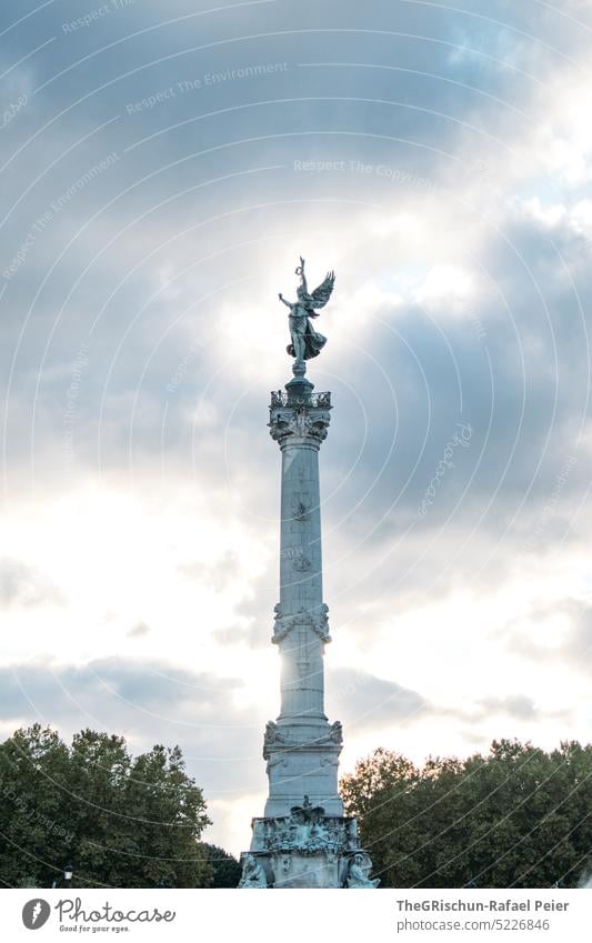 Landmark in the park with fountain Burgundy France touristic city trip Park Building Tourism Europe travel Historic French Blue Brown Angel Column Statue Moody