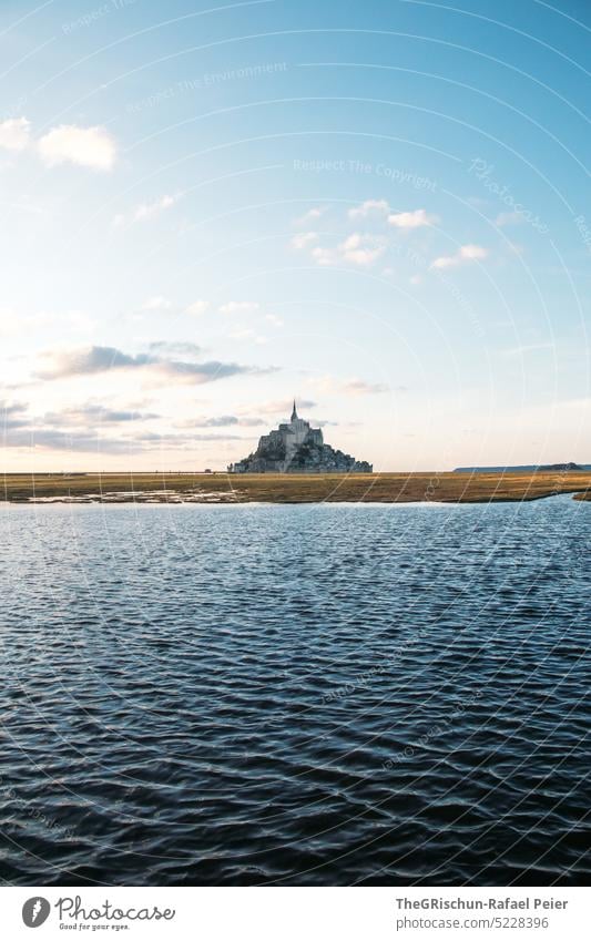 Evening atmosphere and water in front of Mont Saint Michel in France Landscape mont saint michel Mont St. Michel Landmark Tourism Tourist Attraction