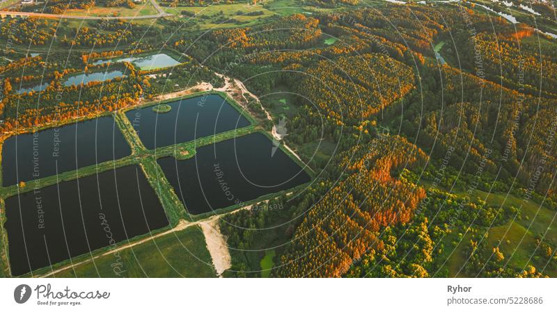 Aerial View Retention Basins, Wet Pond, Wet Detention Basin Or Stormwater Management Pond, Is An Artificial Pond With Vegetation Around The Perimeter, And Includes A Permanent Pool Of Water In Its Design