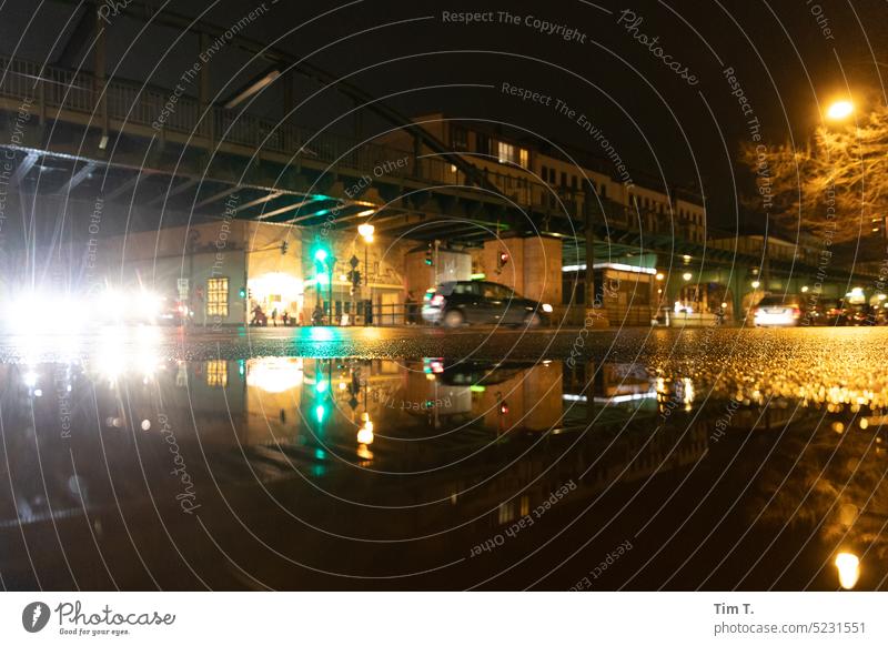 Night reflection in a puddle Prenzlauer Berg Cinema Puddle Reflection Schönhauser Allee Berlin Downtown Exterior shot Capital city Town Old town Deserted