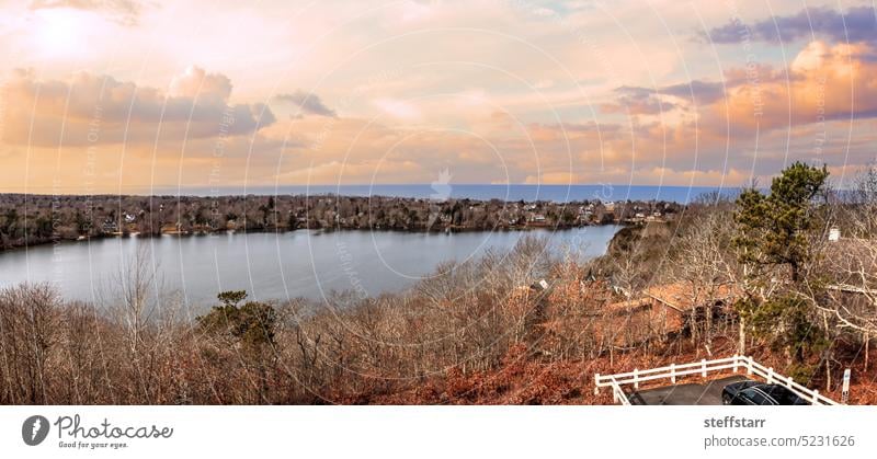 Skyline view of sunrise over Scargo lake and the ocean from the Scargo Tower in Dennis Scargo Lake Cape Cod skyline sunset ocean view landscape Dennis