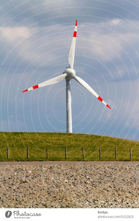 Wind turbine behind a dike Wind energy plant Pinwheel Renewable energy Eco-friendly wind power coast Dike eco-power Climate change Electricity green energy