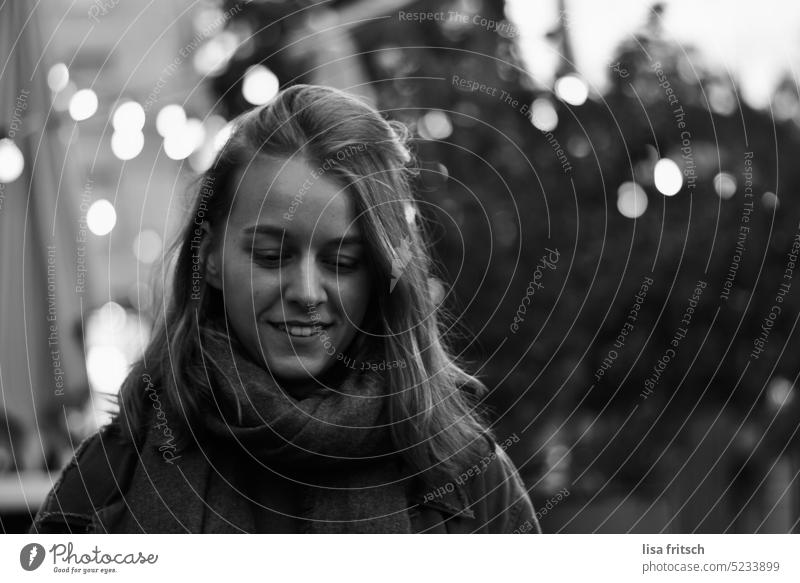 BLACK AND WHITE - YOUNG WOMAN - LOOK DOWN Woman 25-29 years Black & white photo hip Short-haired Downward Adults Exterior shot Contentment naturally Young woman