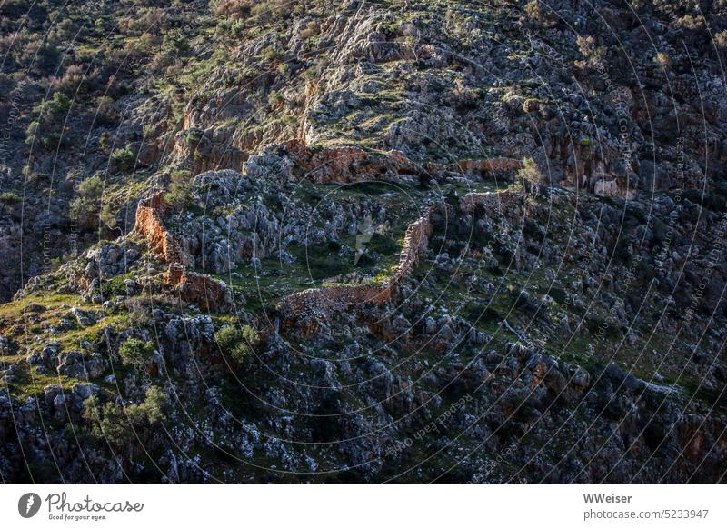 On this hillside once was a monastery, now only a ruin of the wall is left Ruin Transience Historic History of the people Medieval times Former stones mountain