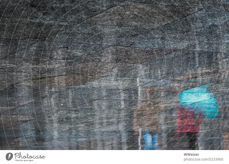 People with umbrellas reflected in the wet gray slabs of the pedestrian zone Rain Weather Wet rainy Bad weather Umbrella rainwear Passers-by people Asphalt