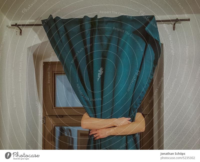 young man hugging curtain as sign of self love Self-Love Healing Retreat Loneliness silent Awareness Private sphere Drape curtain rail Screening Man at home