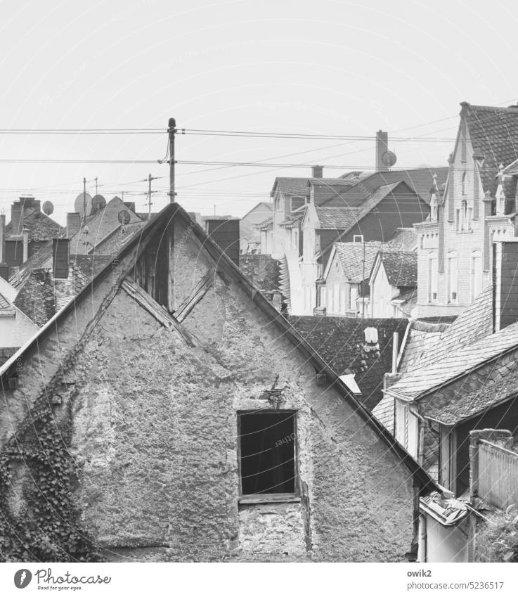 Wired village houses Village Exterior shot nested medieval Old Populated Black & white photo walls roofs pediment antennas Cable power cable Window Building Sky