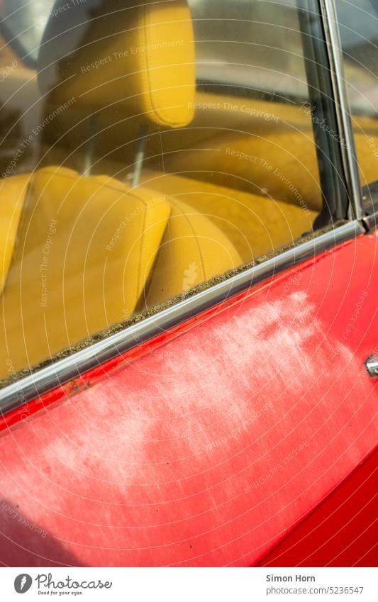 Vintage car view with patina Patina Varnish Tracks Nostalgia Leather Vehicle Detail Retro Old Car Style Yellow locomotion standstill Tin Second-hand